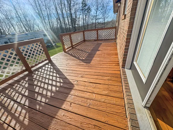 a bathroom with a sink vanity mirror and toilet
