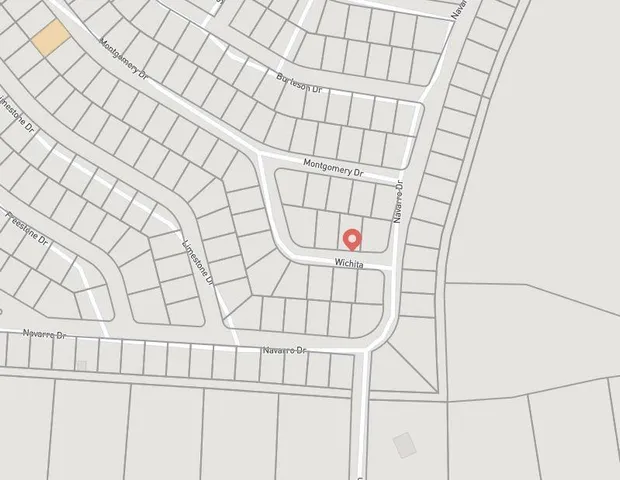 a bathroom with a shower and a window