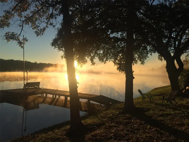 a view of a porch with a floor to ceiling window