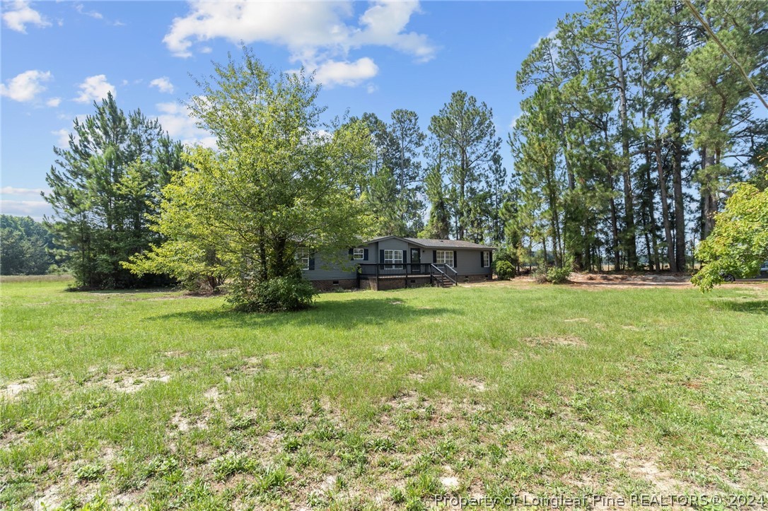 8002 Fayetteville Road Godwin, NC 28344 - Photo 3 of 40 a garden view
