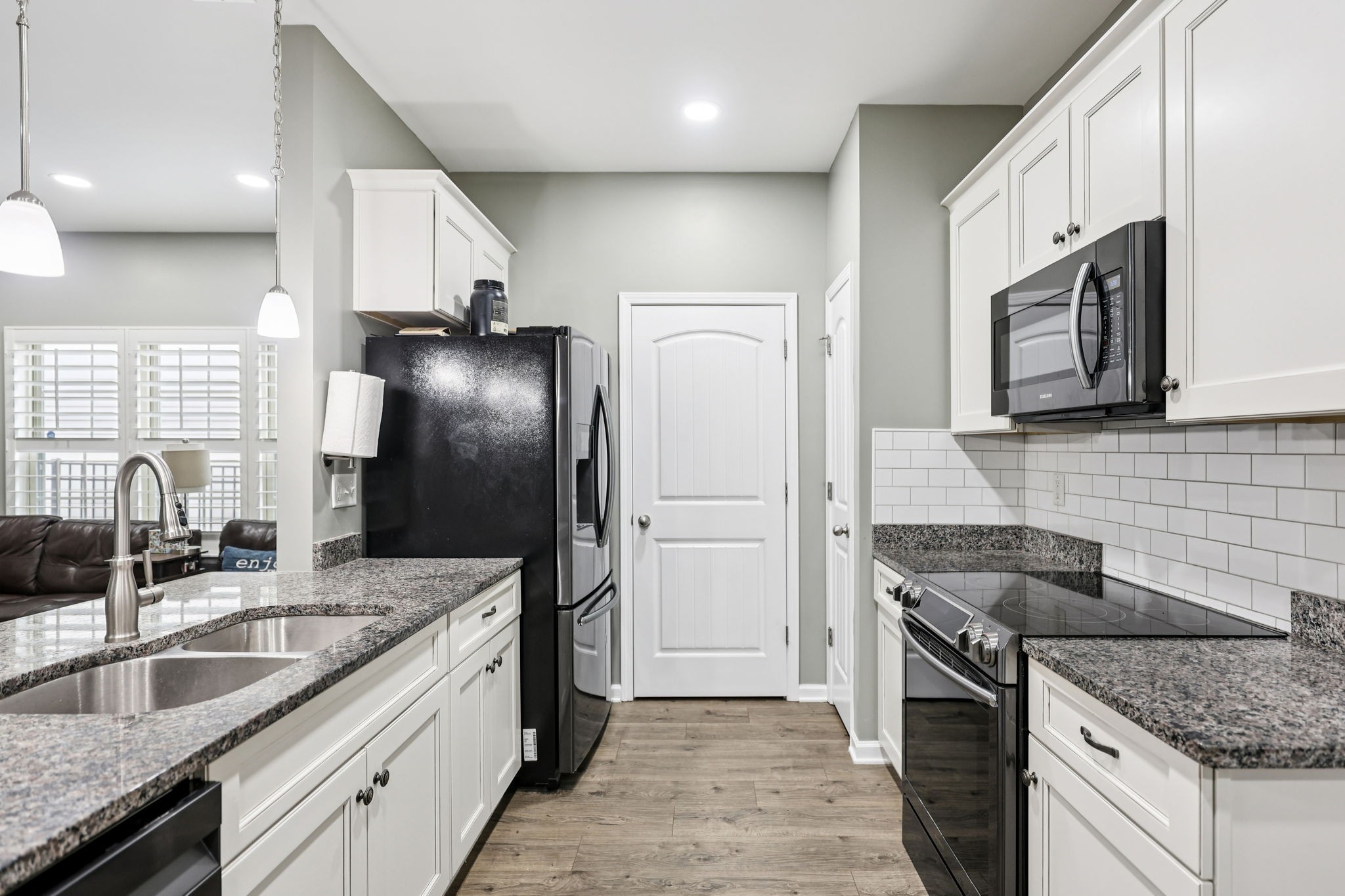 2263 Cason Lane Murfreesboro, TN 37128 - Photo 6 of 19 a kitchen with stainless steel appliances granite countertop a sink stove and refrigerator
