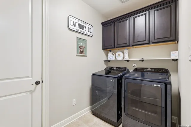 a kitchen with a stove and a refrigerator