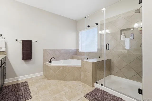 a view of a chairs and table in the patio