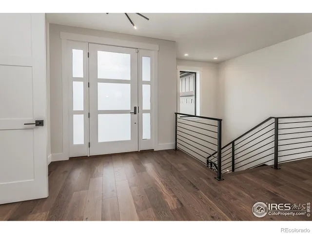 a view of a livingroom with wooden floor