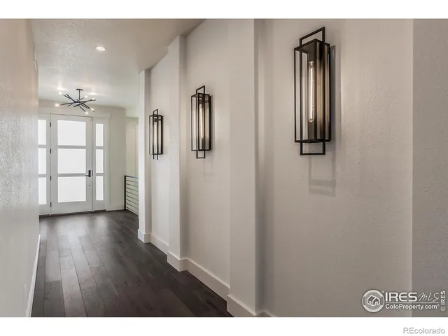 a view of entryway with wooden floor