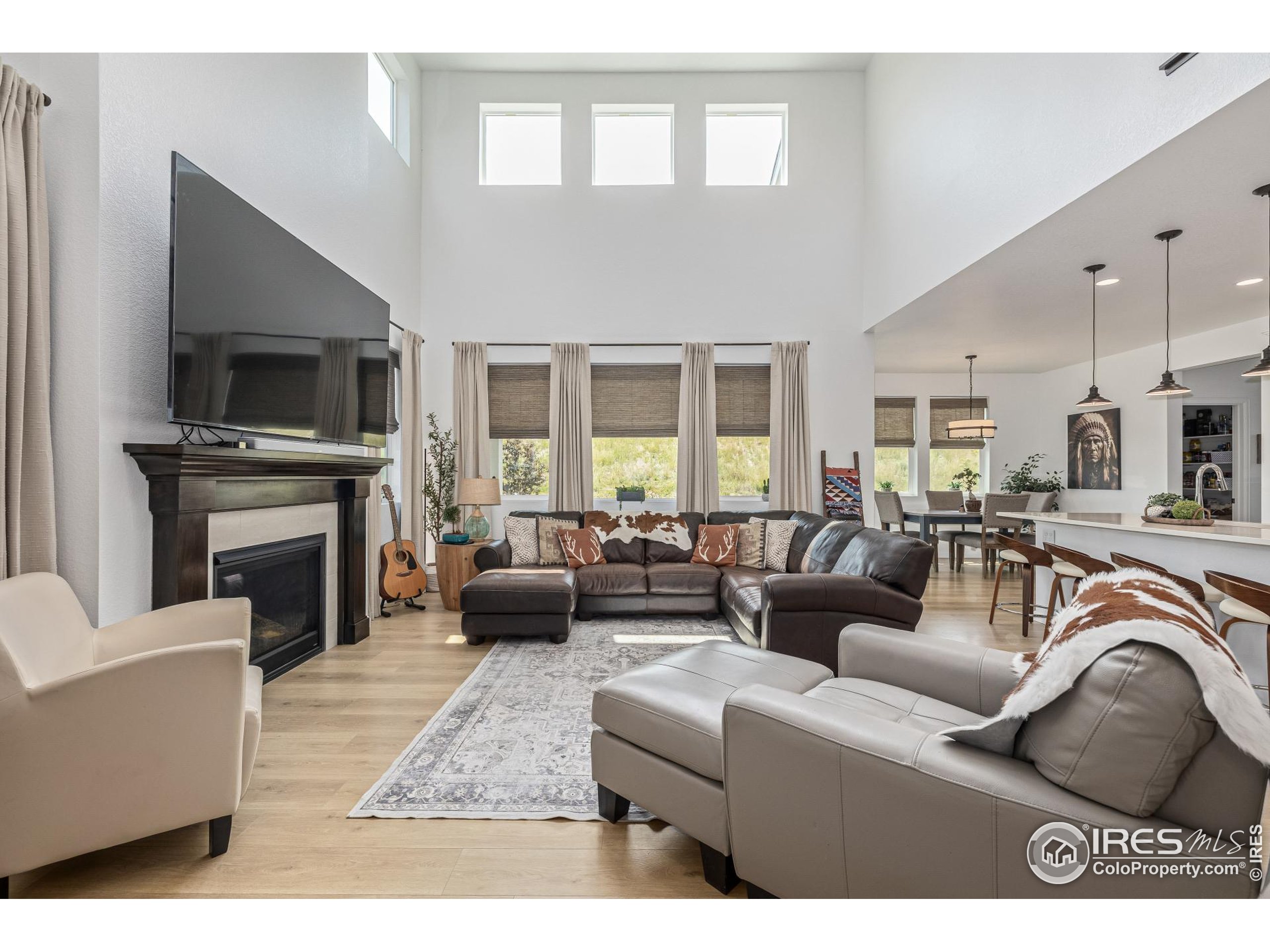 3624 Rucksack Court Castle Rock, CO 80108 - Photo 11 of 50 a living room with furniture fireplace and flat screen tv