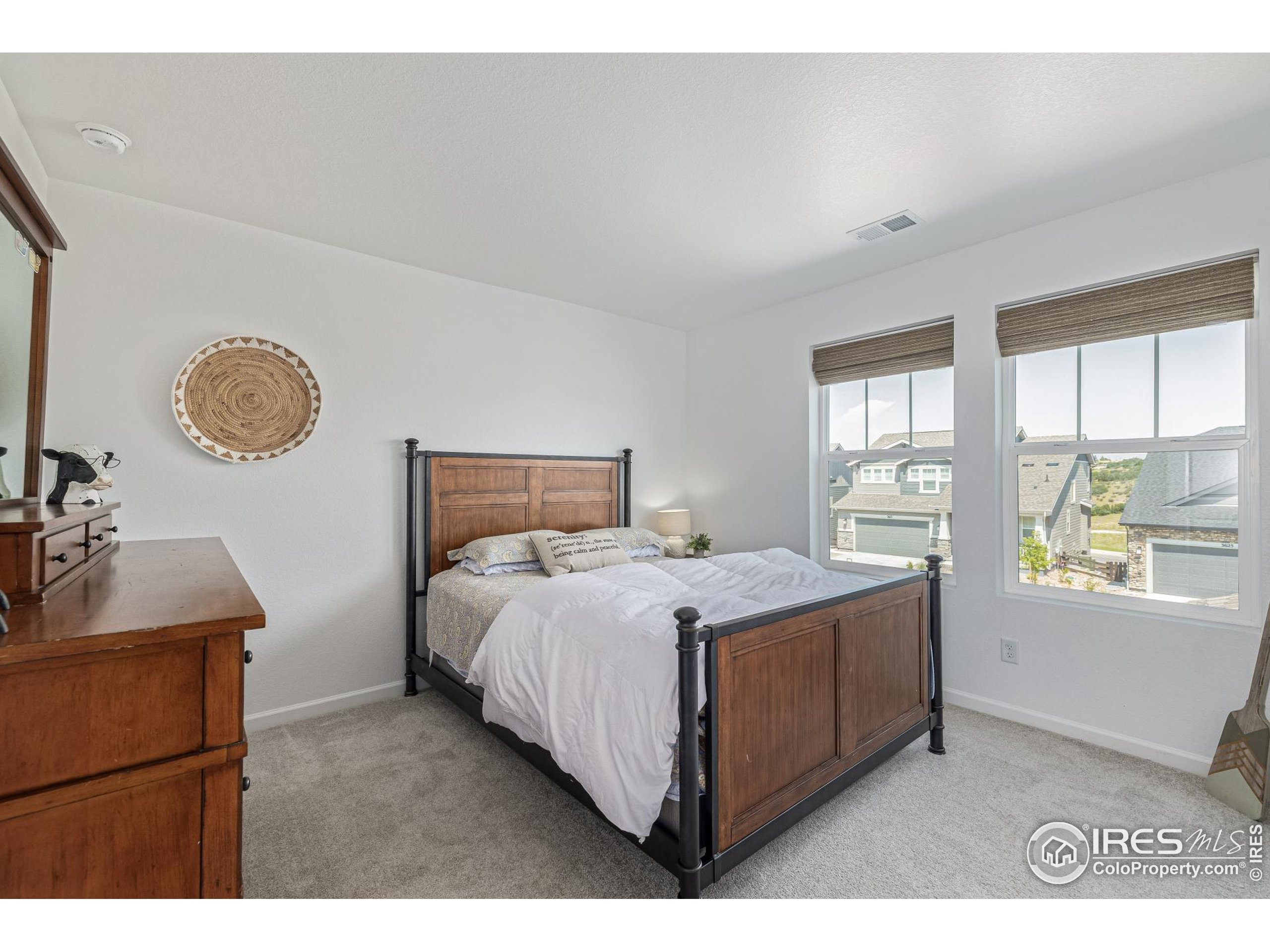 3624 Rucksack Court Castle Rock, CO 80108 - Photo 33 of 50 a bedroom with a bed and a window