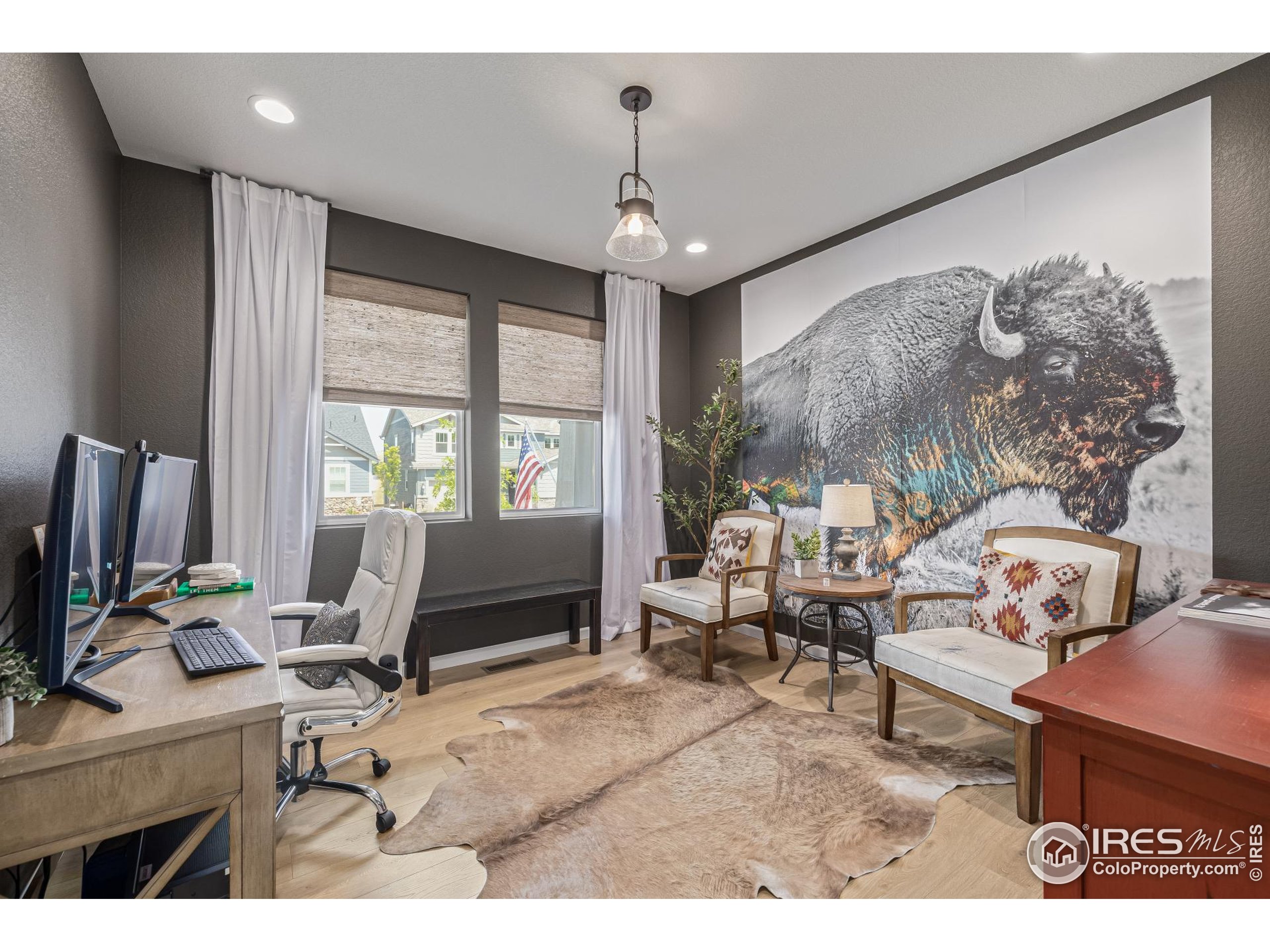 3624 Rucksack Court Castle Rock, CO 80108 - Photo 5 of 50 a living room with furniture a desk and large window