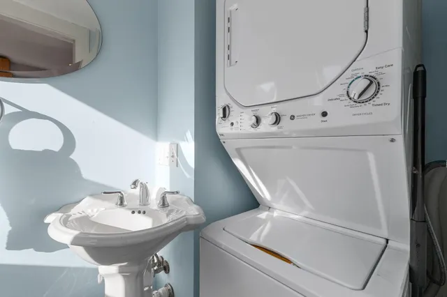 a bathroom with a sink and mirror