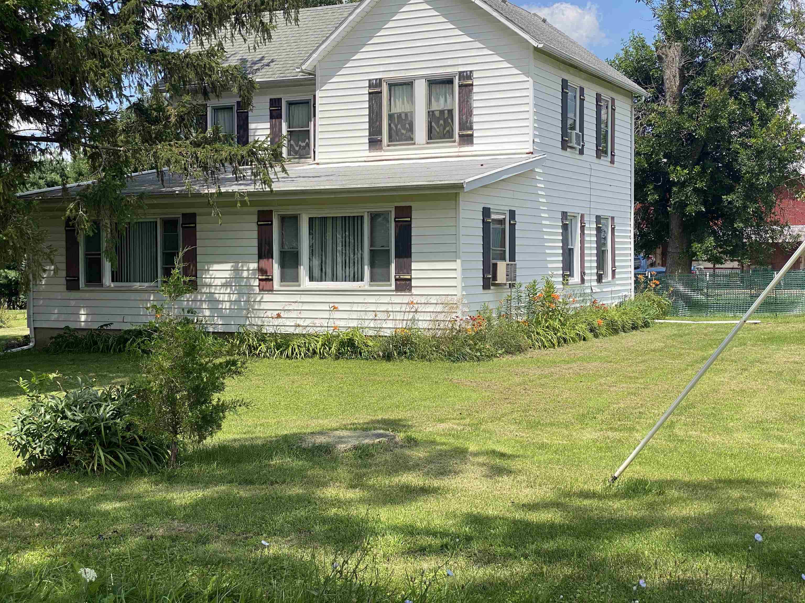 3848 West Yoder Road Freeport, IL 61032 - Photo 1 of 12 a front view of house with yard and green space