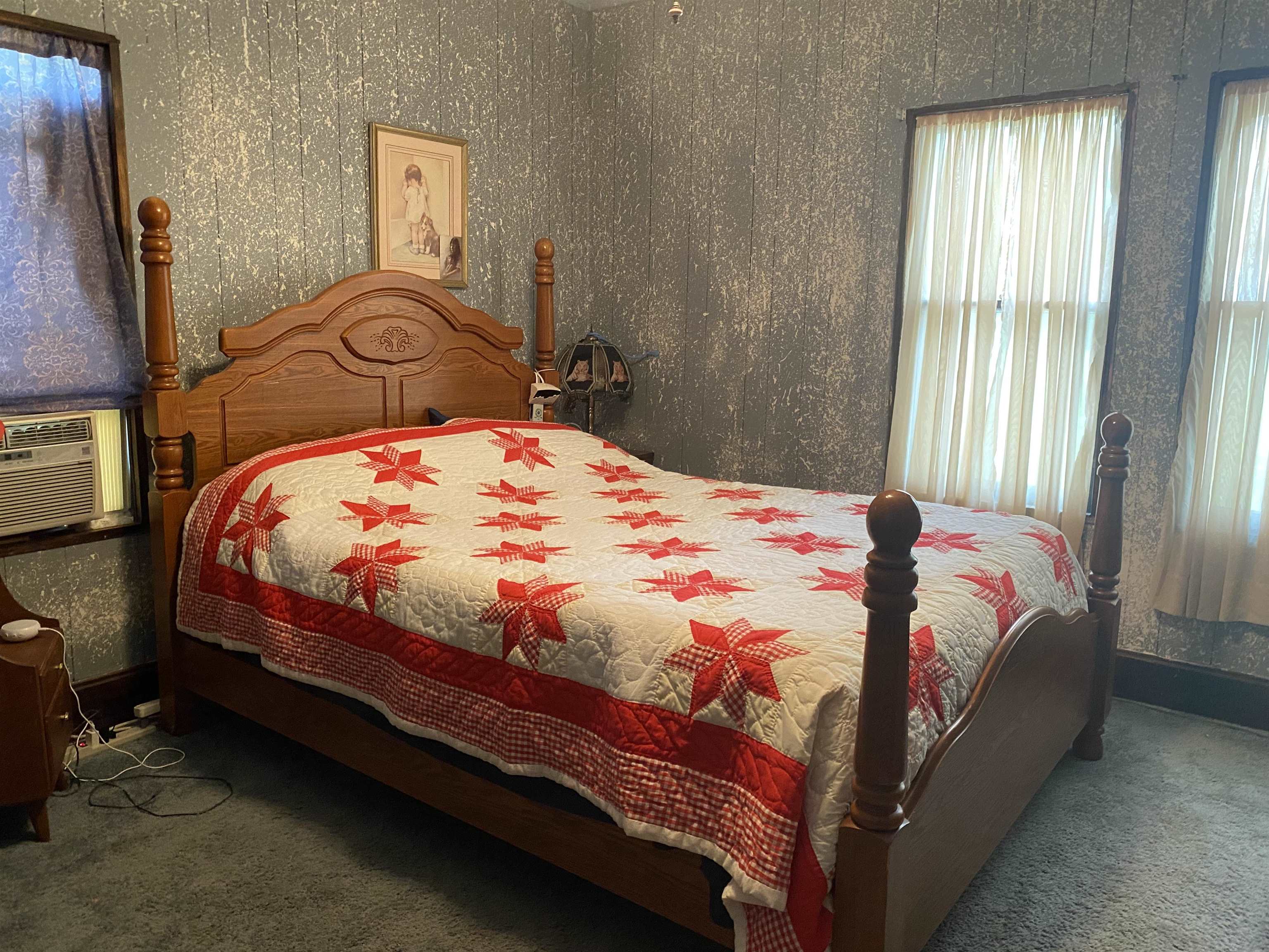 3848 West Yoder Road Freeport, IL 61032 - Photo 11 of 12 a bedroom with a bed and a window