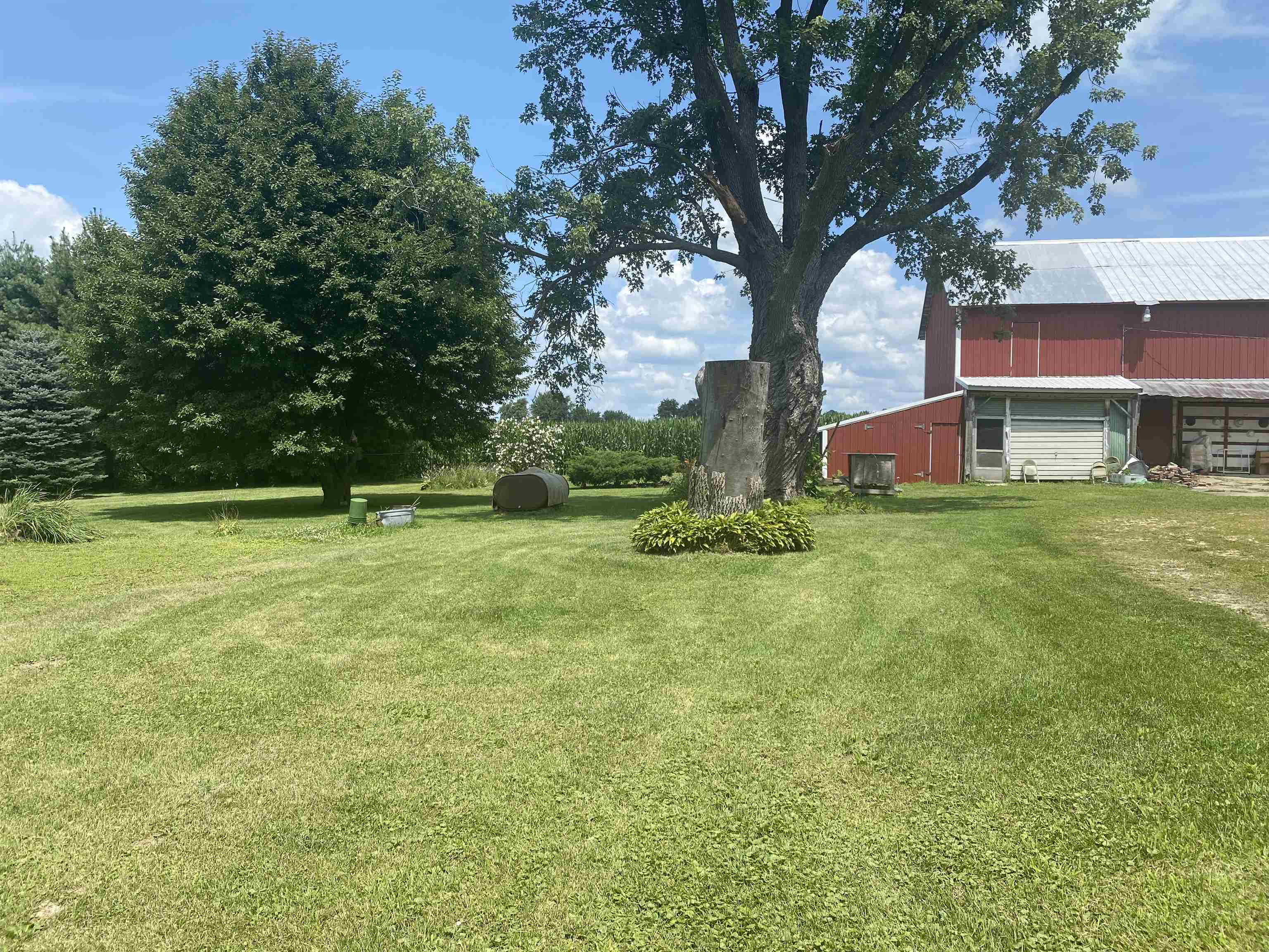 3848 West Yoder Road Freeport, IL 61032 - Photo 3 of 12 a view of a house with a big yard
