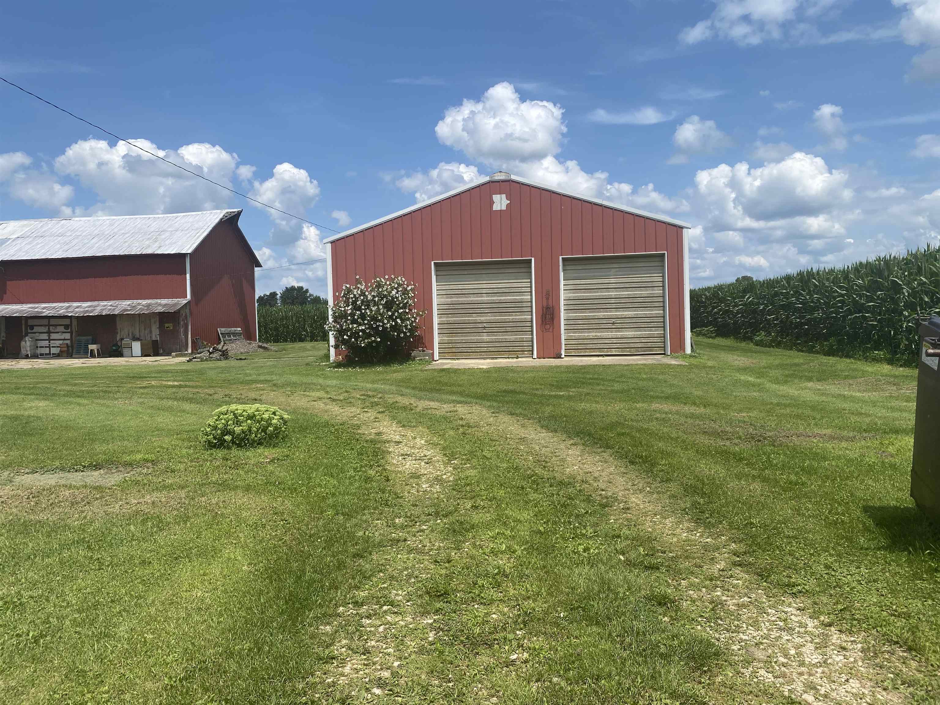 3848 West Yoder Road Freeport, IL 61032 - Photo 4 of 12 a house view with a garden space