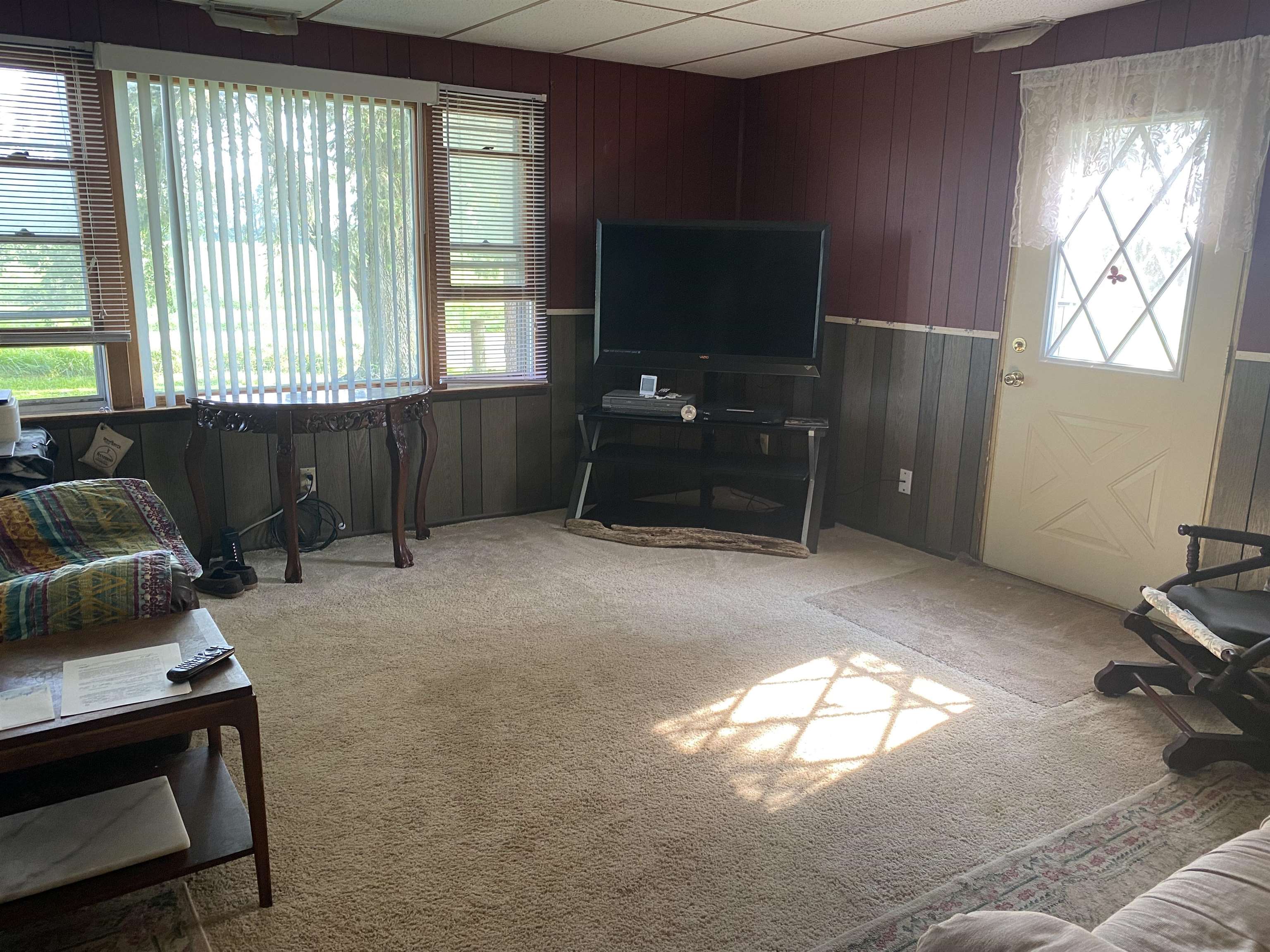 3848 West Yoder Road Freeport, IL 61032 - Photo 7 of 12 a living room with furniture and a flat screen tv