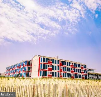 a balcony with a book shelf