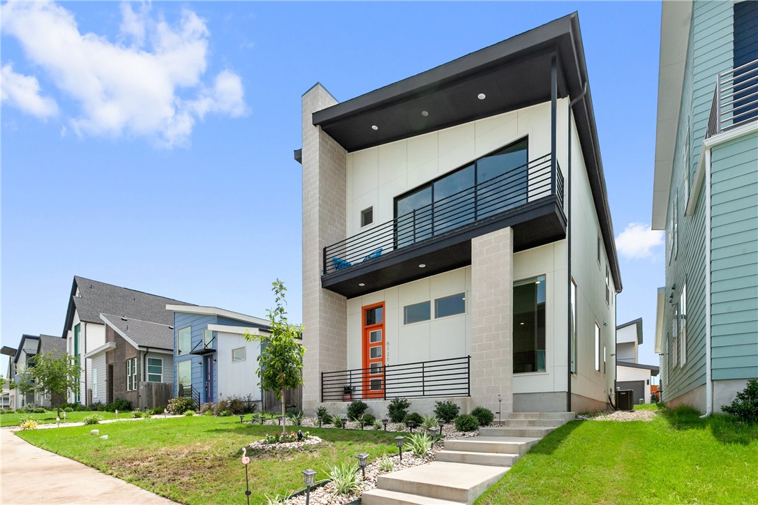 6121 Florencia Lane Austin, TX 78724 - Photo 1 of 1 a front view of a house with garden
