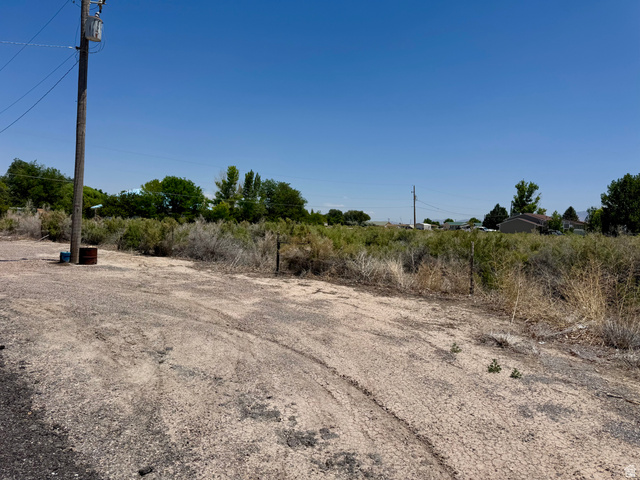100 East 400th Street South Delta, UT 84624 - Photo 9 of 14 Cleared parcel with visible utility pole