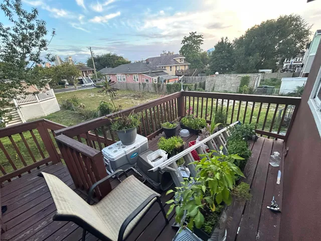 a view of a roof deck with couches