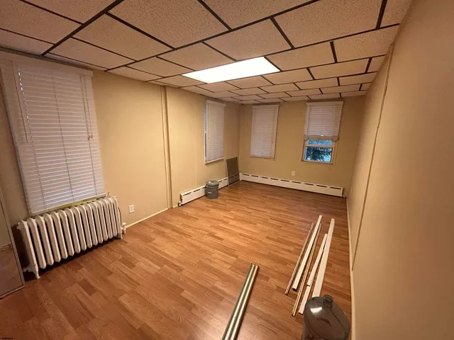 a view of a room with stairs and a window