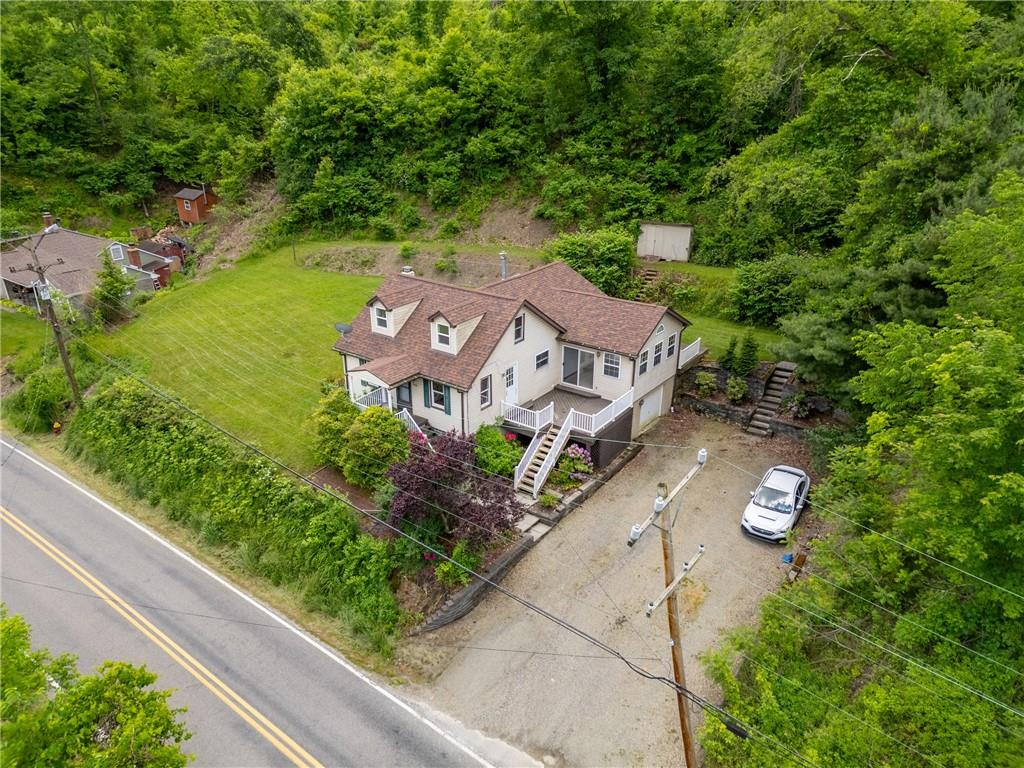 1618 Days Run Road Tarentum, PA 15084 - Photo 3 of 38 a aerial view of a house with a yard