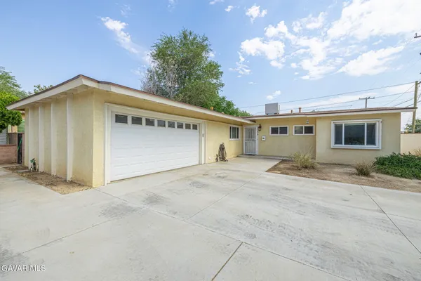 a view of a house with a patio