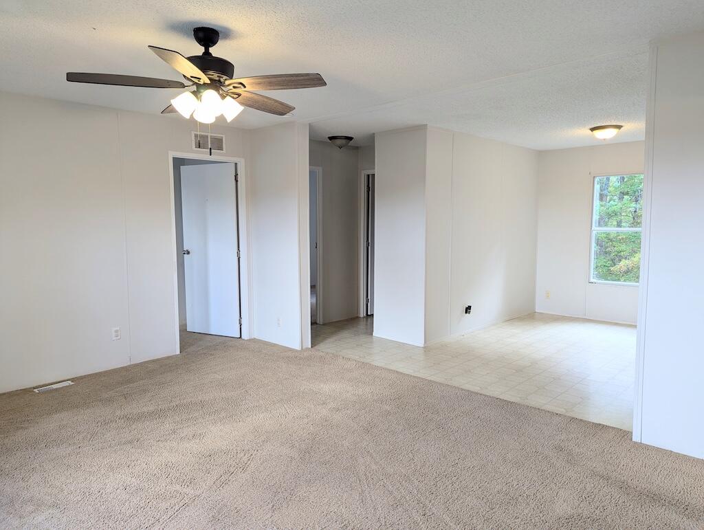 3335 Daniels Run Road Northeast Check, VA 24072 - Photo 17 of 23 a view of a big room with a chandelier fan and windows