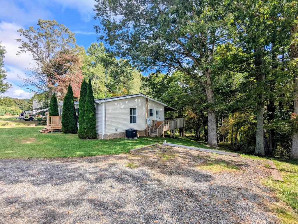 3335 Daniels Run Road Northeast Check, VA 24072 - Photo 6 of 23 a view of a house with a yard