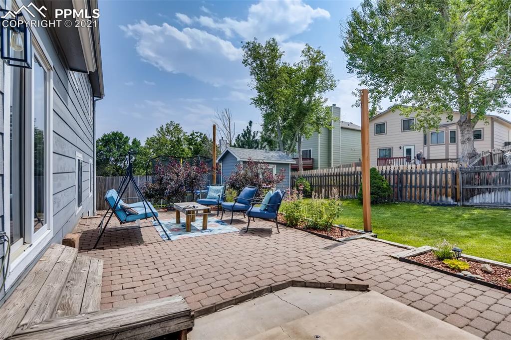 7330 Julynn Road Colorado Springs, CO 80919 - Photo 25 of 28 a view of outdoor space yard deck and patio