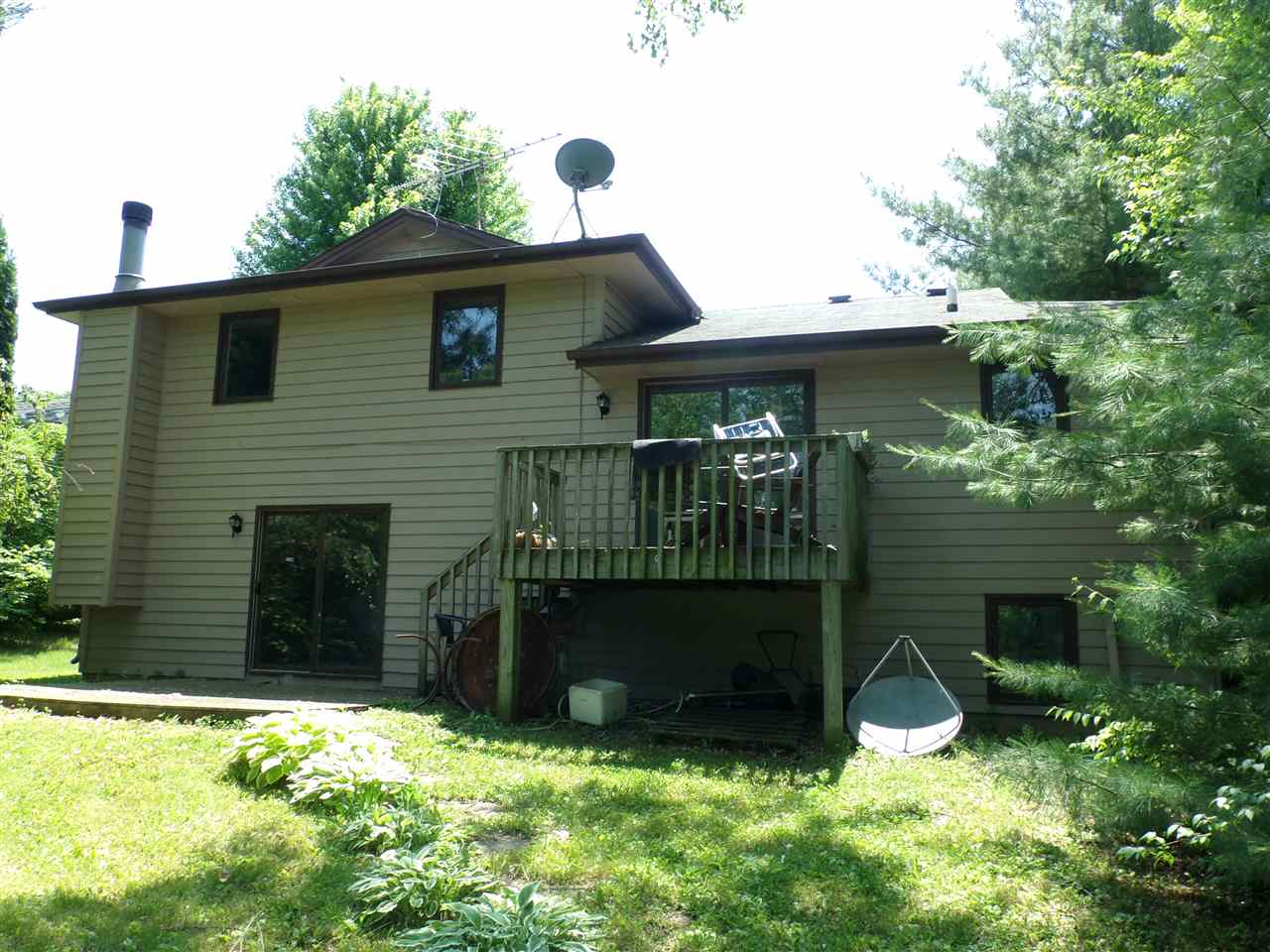 216 Rochester Road Northeast Poplar Grove, IL 61065 - Photo 3 of 17 a front view of a house with a yard