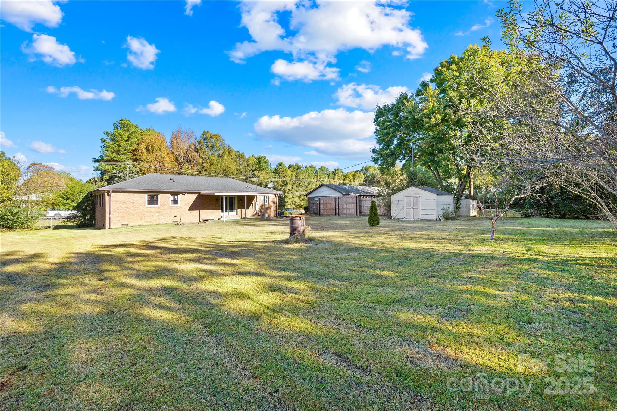 1208 Stallings Road Matthews, NC 28104 - Photo 17 of 18 a front view of a house with swimming pool