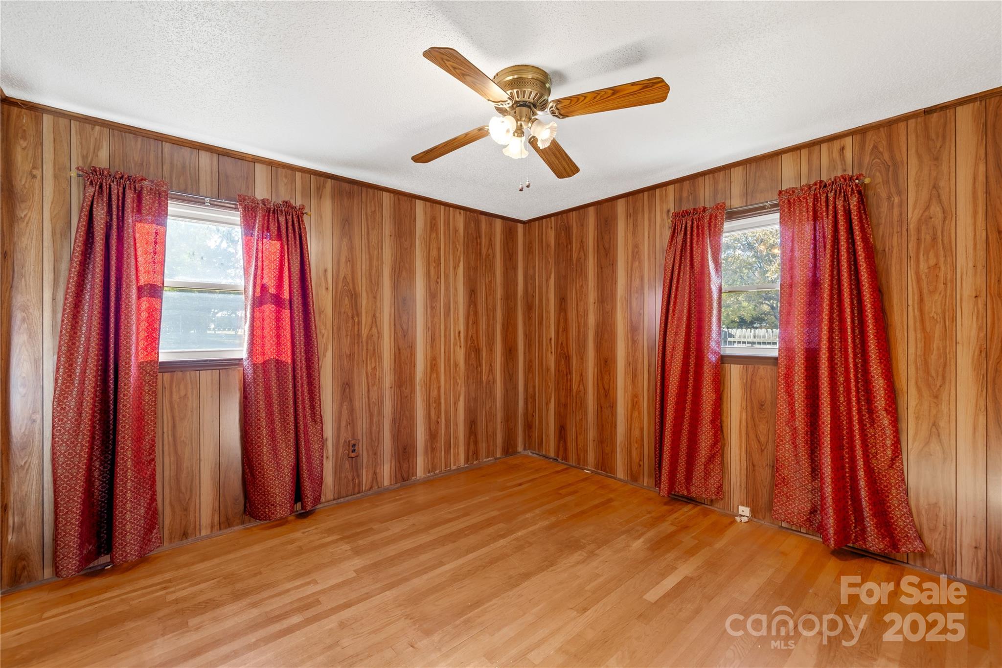 1208 Stallings Road Matthews, NC 28104 - Photo 10 of 18 a view of a room with window and a ceiling fan