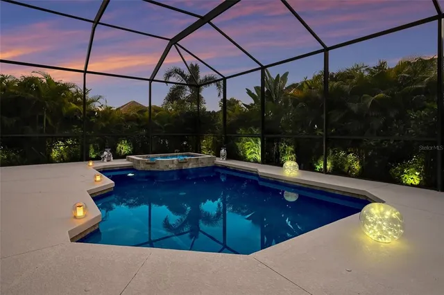 a view of a swimming pool with a patio