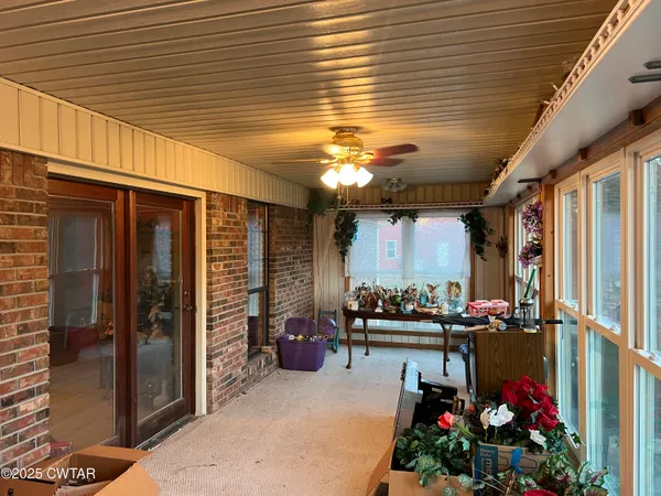 a view of an outdoor space and basketball court