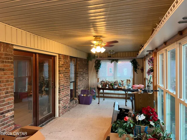a view of an outdoor space and basketball court
