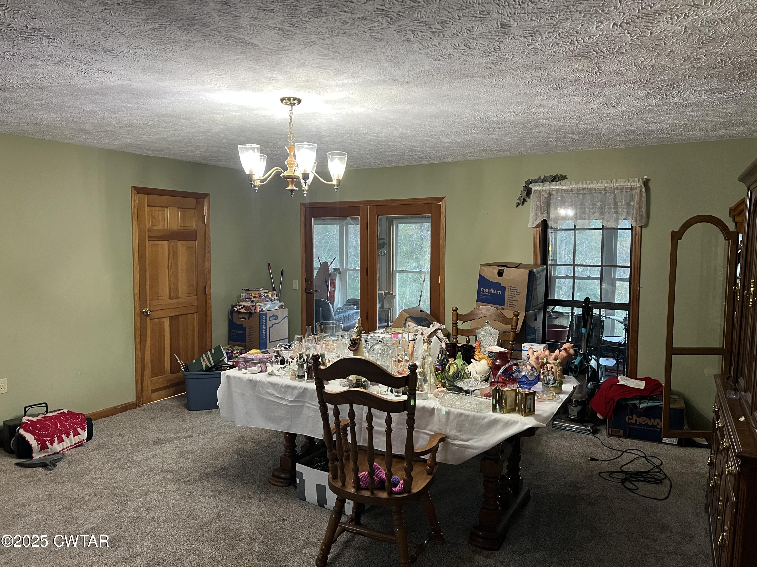 4335 Silerton Road Henderson, TN 38340 - Photo 7 of 24 a view of a dining room with furniture