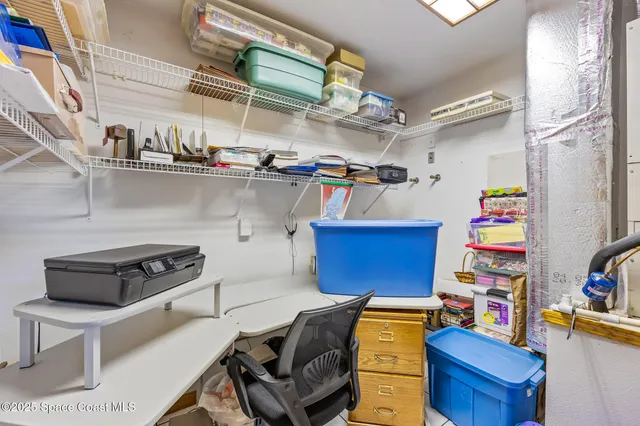 a view of storage and utility room