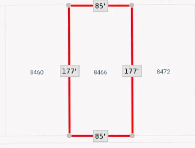 a picture of a bathroom with a shower