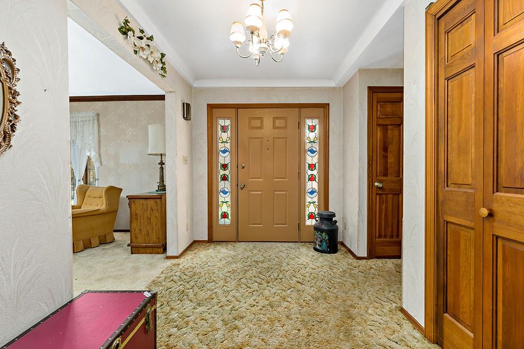 275 Swearingen Road Georgetown, PA 15043 - Photo 2 of 40 a bedroom with furniture and a window