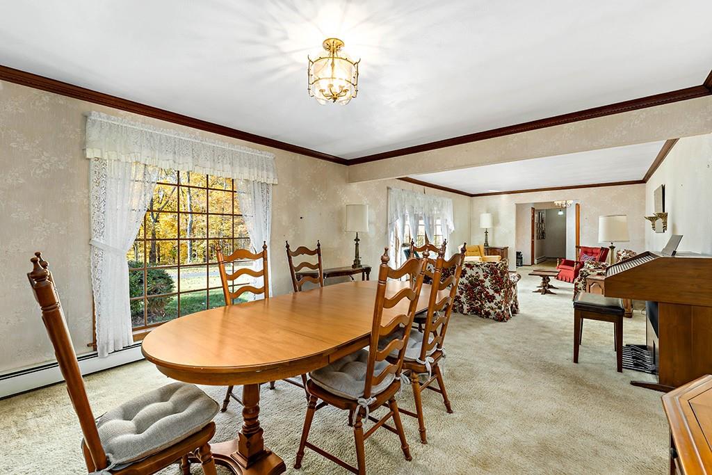 275 Swearingen Road Georgetown, PA 15043 - Photo 5 of 40 a view of a dining room with furniture and a window