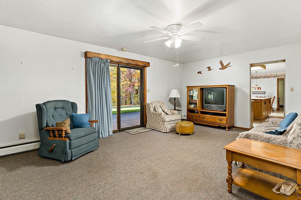 275 Swearingen Road Georgetown, PA 15043 - Photo 8 of 40 a living room with furniture and a chandelier