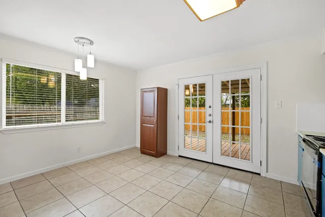 an empty room with windows