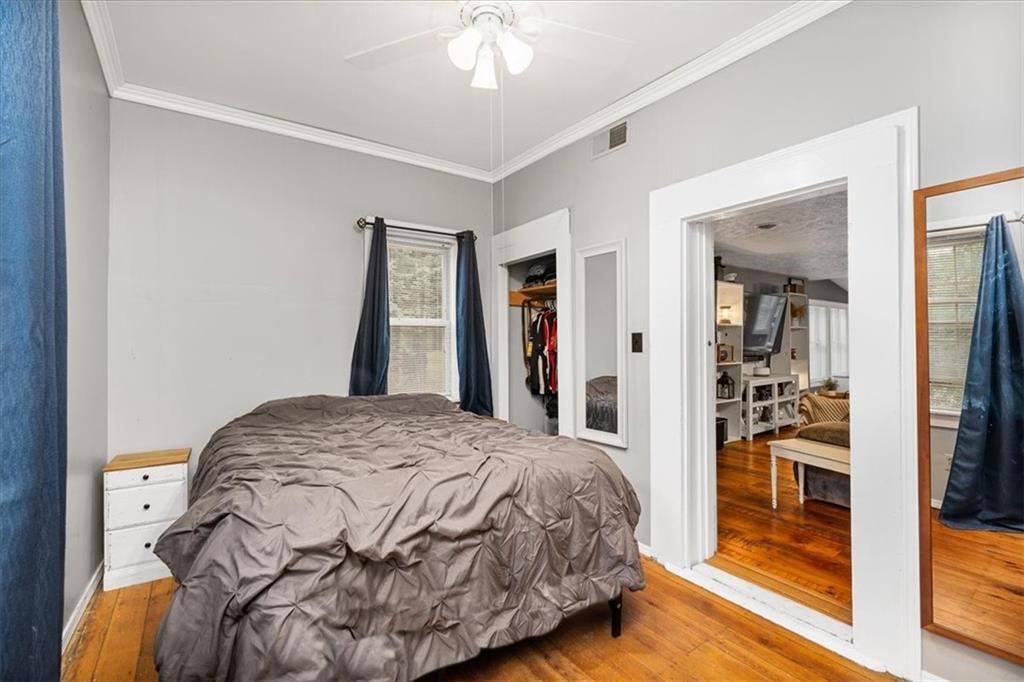 172 Queen Junction Road Butler, PA 16001 - Photo 17 of 38 a bedroom with a bed and a walk in closet