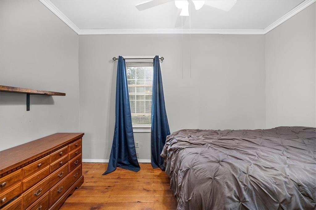 172 Queen Junction Road Butler, PA 16001 - Photo 18 of 38 a bed sitting in a bedroom next to a window