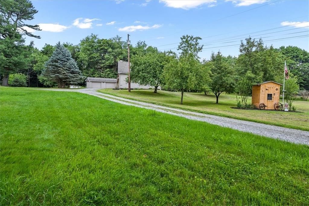 172 Queen Junction Road Butler, PA 16001 - Photo 30 of 38 a view of a golf course with a lake