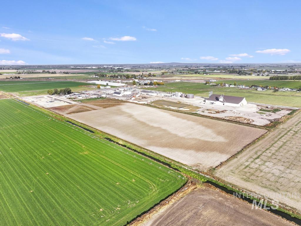 200 South 200 West Rupert, ID 83350 - Photo 20 of 25 Aerial view of sparsely populated area featuring rows of crops