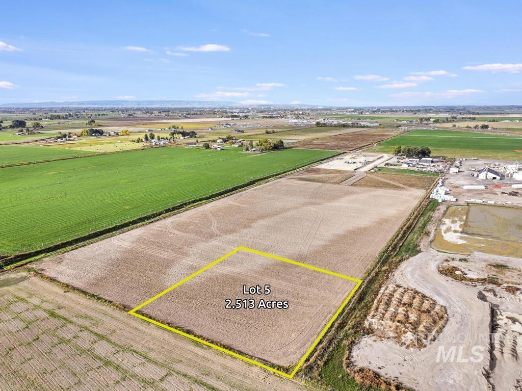 200 South 200 West Rupert, ID 83350 - Photo 2 of 25 Aerial view of sparsely populated area featuring farmland and property parcel outlined
