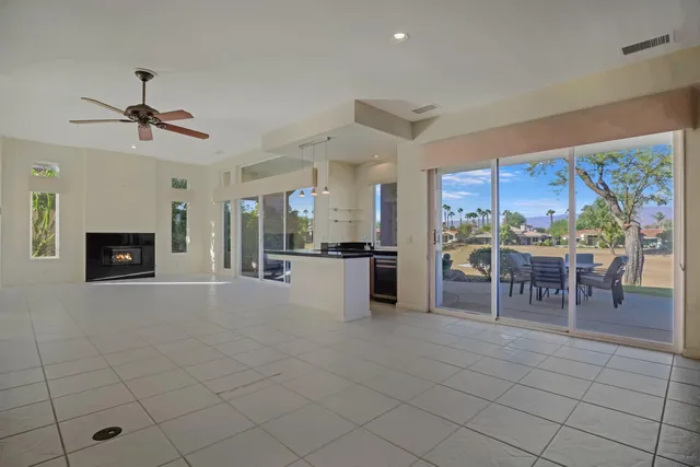 a view of kitchen with furniture and window