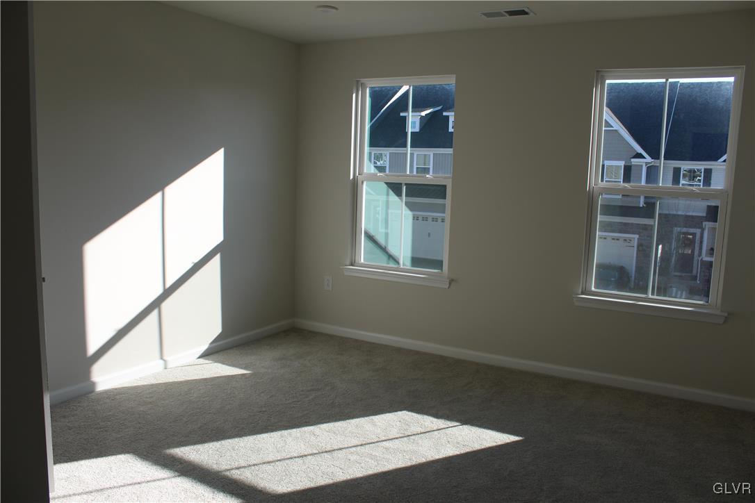 2584 Raya Way Easton, PA 18045 - Photo 22 of 35 an empty room with windows