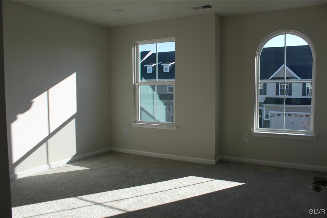 2584 Raya Way Easton, PA 18045 - Photo 23 of 35 a front view of a house with wooden floor