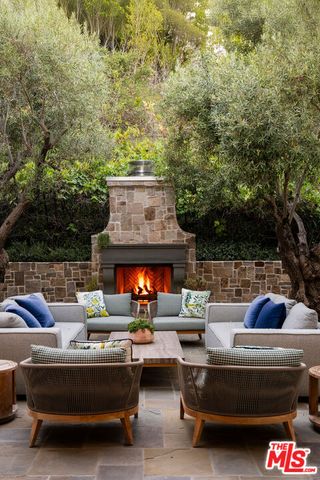 a bedroom with a couch and a window